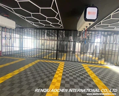 Professional Creation: Classic Hexagonal Lighting And Garage Floor Tiles To Build The Perfect Car Workshop!